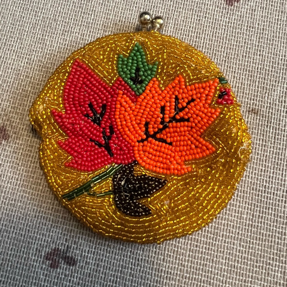 Hand beaded kisslock coin purse